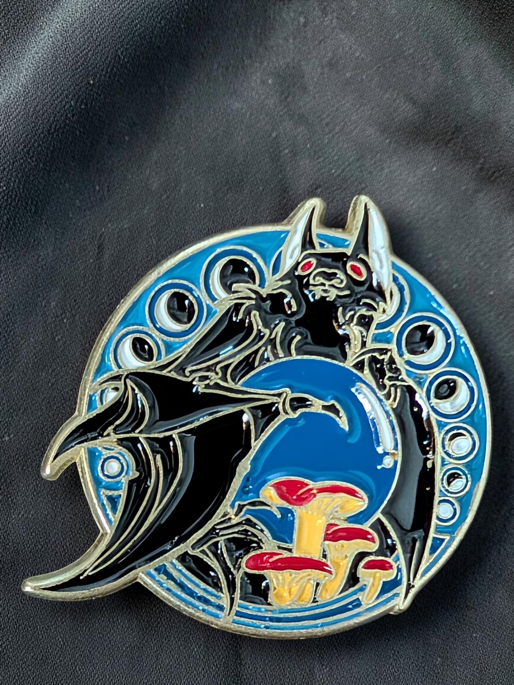 Bat & Mushrooms Enamel Pin in Blue, Black, Red, Yellow
